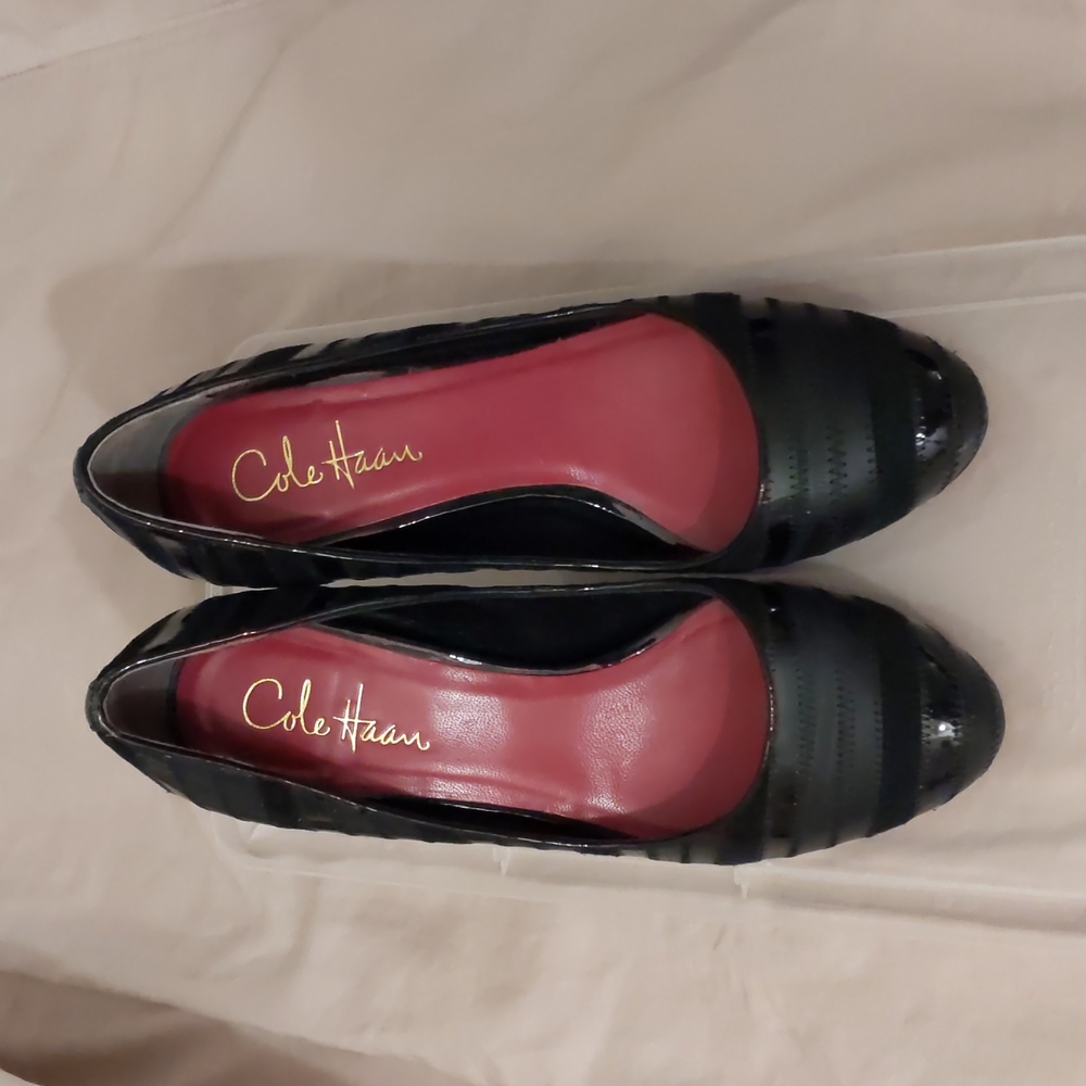 Damaged Heel**Size 6.5 Cole Haan Black almond-toe heels. Mixed Leathers!